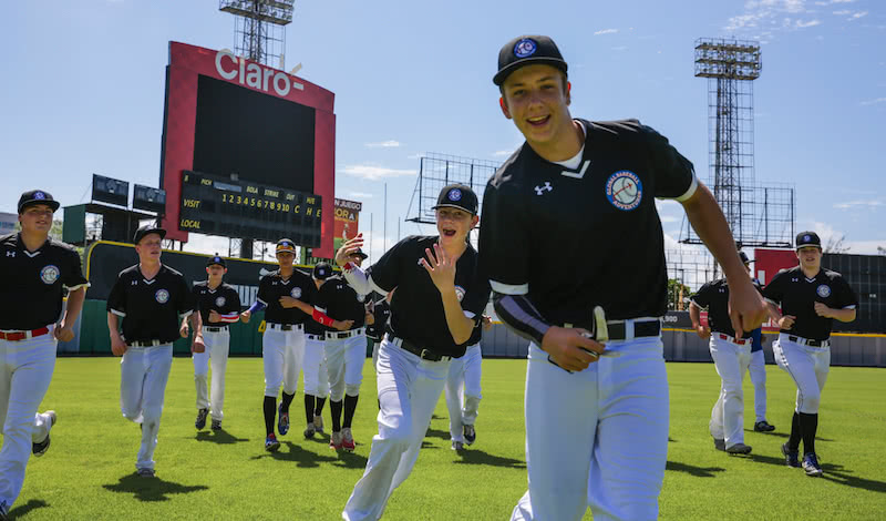 GBA players on field at Juan Marichal Stadium, Dominican Republic